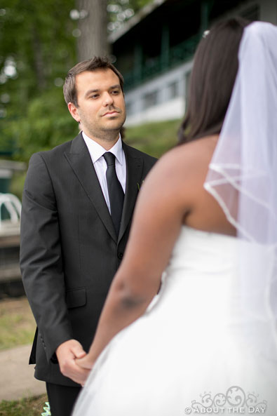 Groom looks at Bride during ceremony