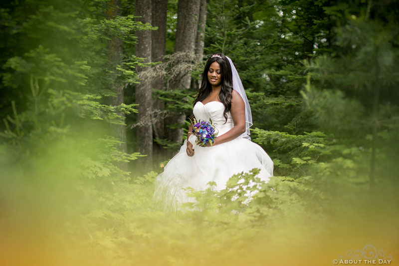 Bride stands in the forest near Manitowish Waters