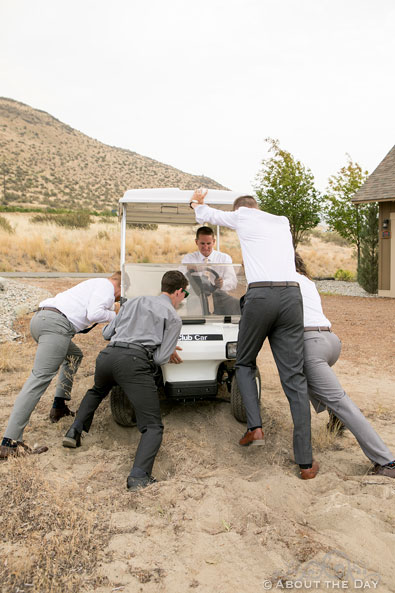 Chris and Groomsmen try to get golf card unstuck