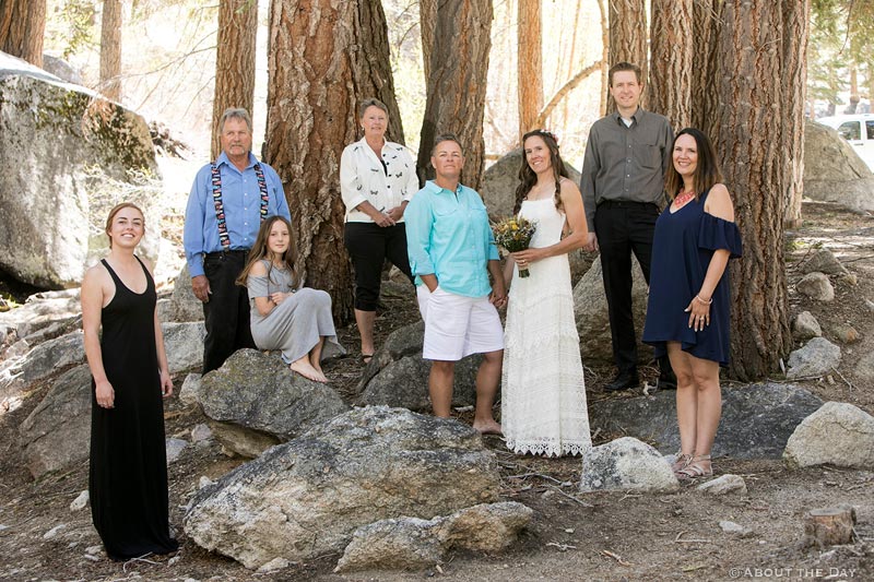 The brides and their families in the woods