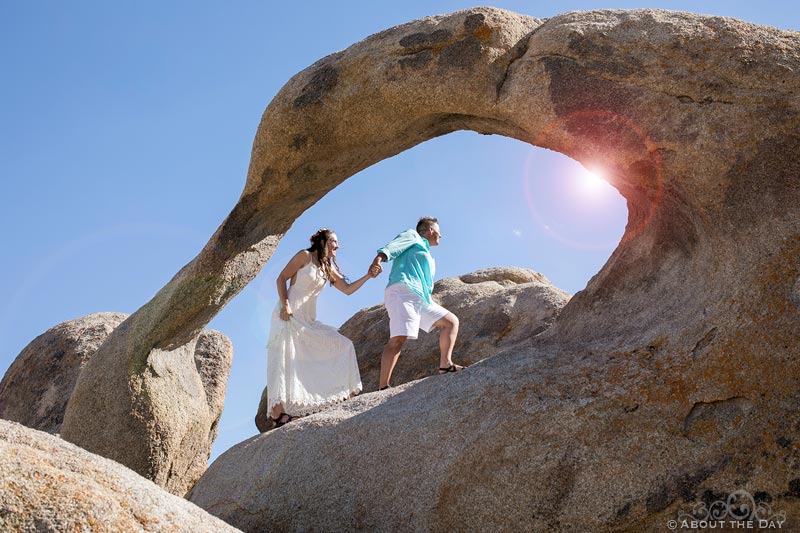 Both Brides climb up through an arch rock