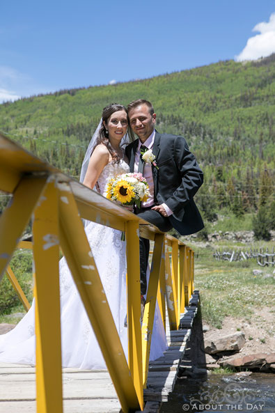 Brides and Groom on yellow bridge