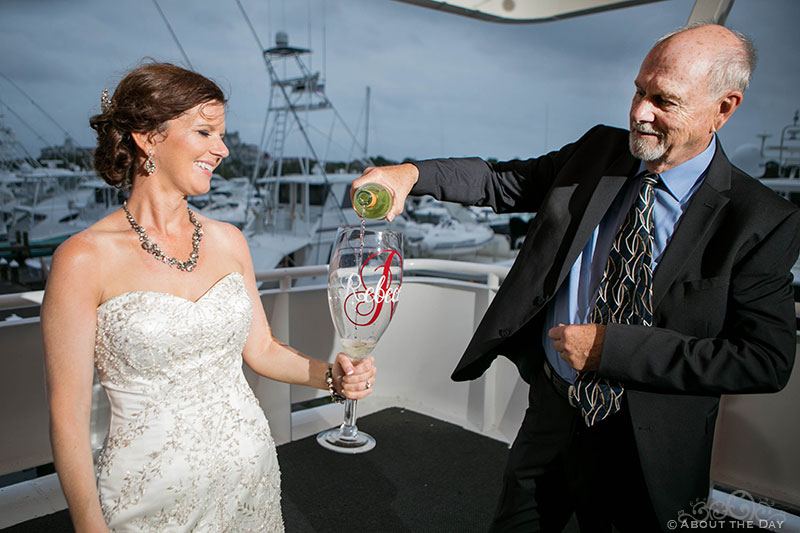Rebecca has a small glass of wine on the Solaris Yacht in Miramar Beach, FL