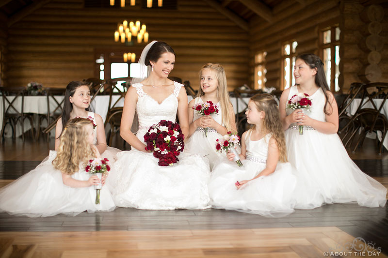 The Bride is surrounded by her beautiful flower girls