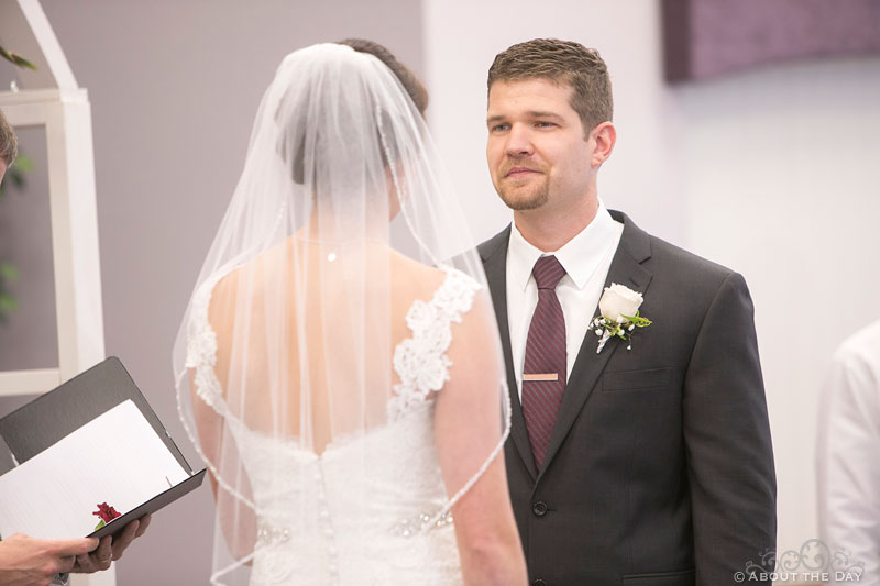 Groom speaks his vows during wedding ceremony