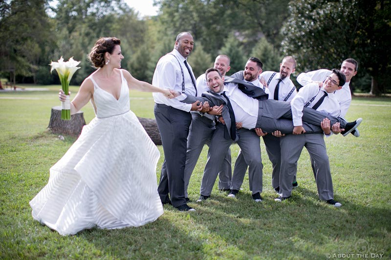 Erica tries to pull Keith away from his Groomsmen