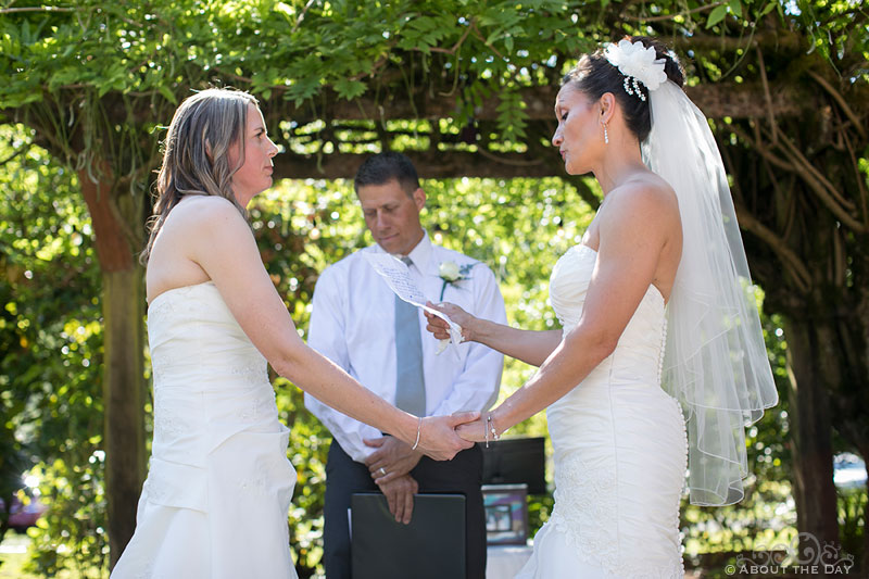 Brides read vows to each other