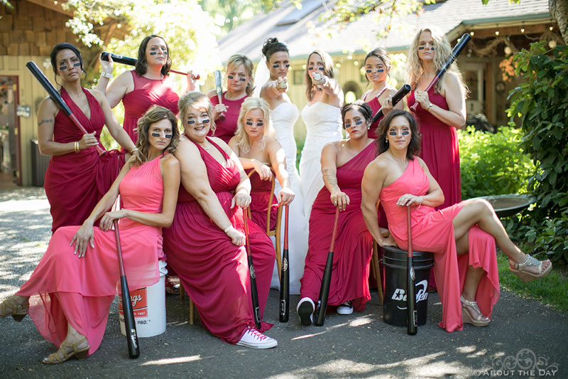 Gay Brides and their Bridesmaids pose with Baseball theme at Albees Garden in Olympia