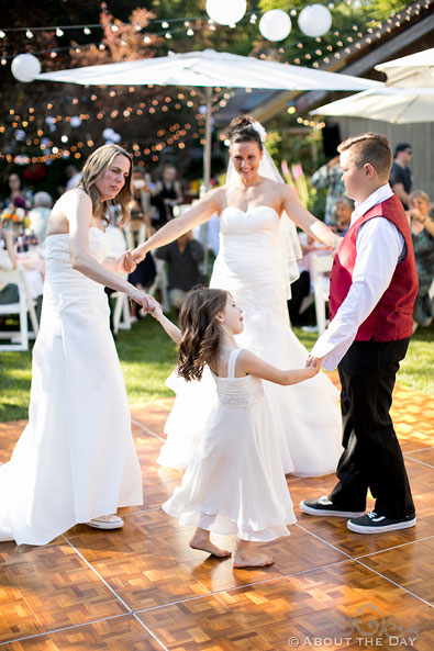 Brides and their kids first dance