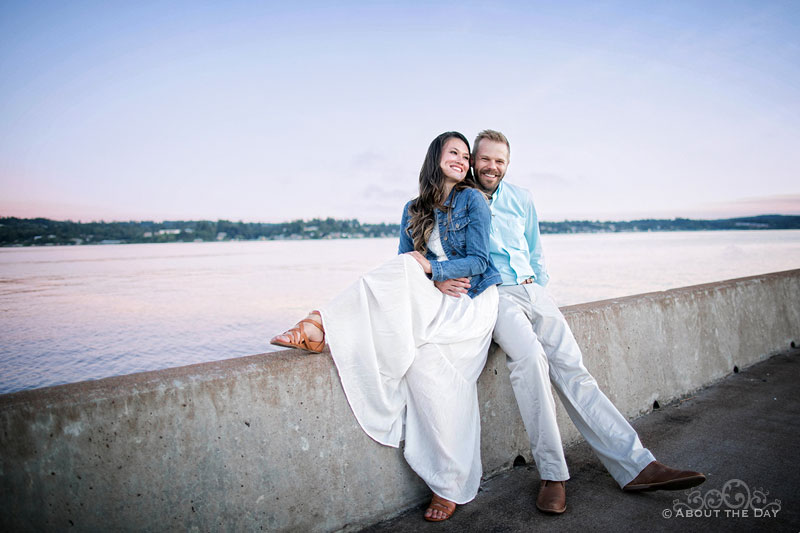 Ami & Eric pose on the cement wall at Bremerton Marina