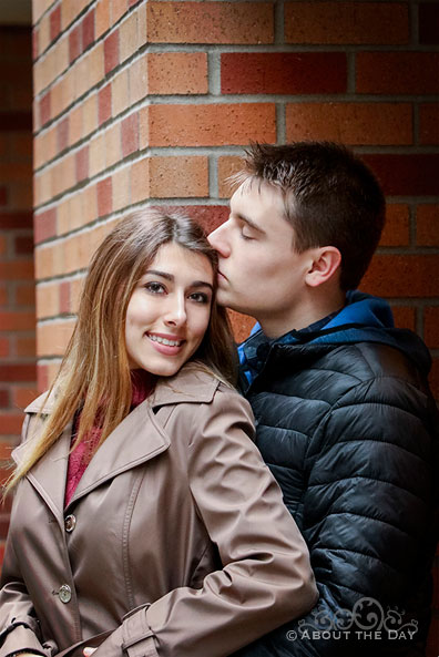 Will & Madelyn with a brick background in Bellevue