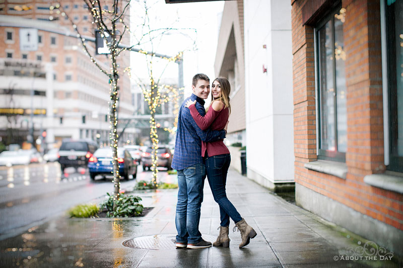 Will & Madelyn on the rainy street near Bellevue Square, WA