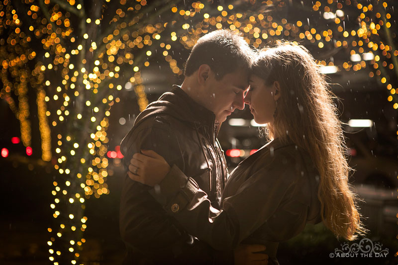 Will & Madelyn brave the obvious downpour with Christmas lights at Bellevue Square