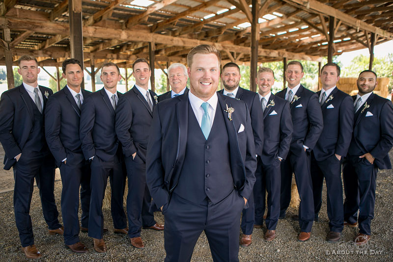 Austin stands with all his groomsmen lined up