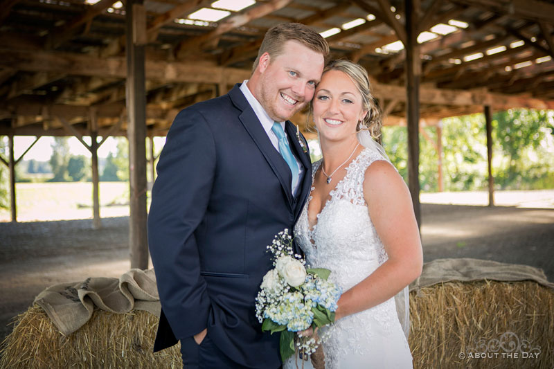 A great portrait of the Bride and Groom in the hay barn at Heiser Farms
