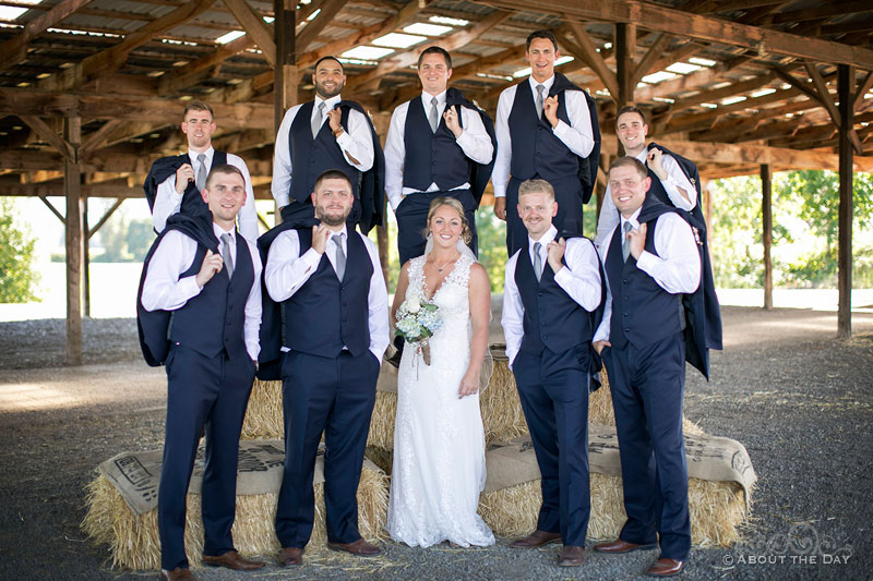 The Bride poses with all the groomsmen