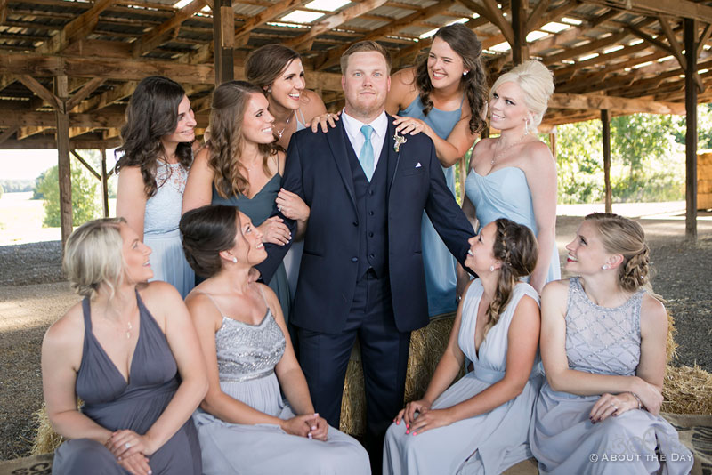 The Groom looks too cool with all the Bridesmaids