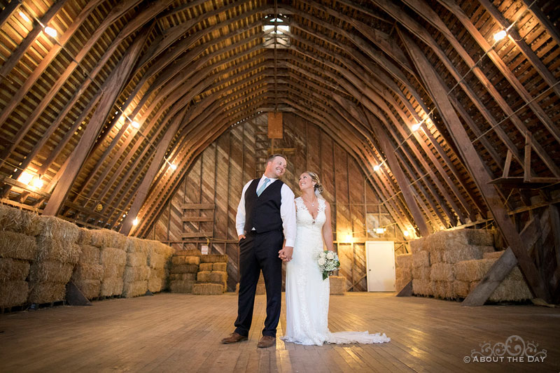 The Bride and Groom inside the big barn at Heiser Farms