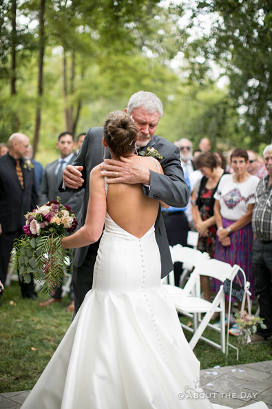 Hannah's father gives her away at the ceremony
