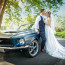 Douglas & Courtney kiss in front of their Mustang