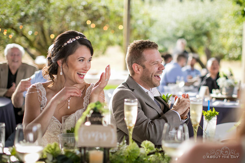 The Bride and Groom have a good laugh during the toasts at The Orchard at Sunshine Hill