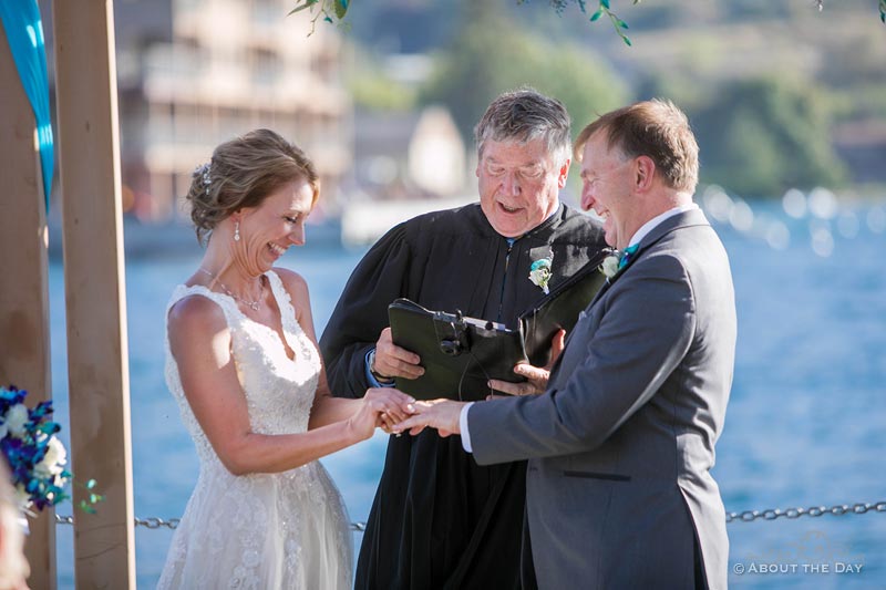 Bride and Groom exchange vows at Campbell's Resort at Lake Chelan