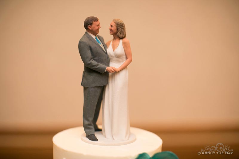 A perfect replica of Greg and Teresa for the wedding cake topper