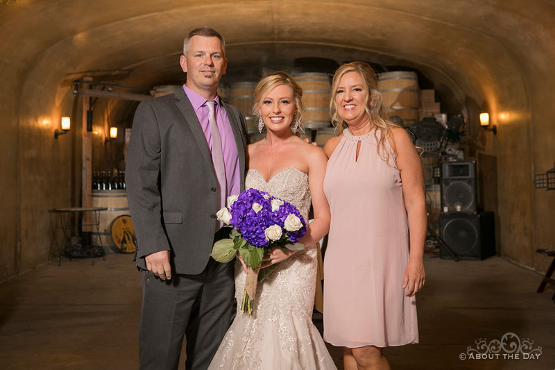 Alexis and her parents in the cave at Karma Vineyards