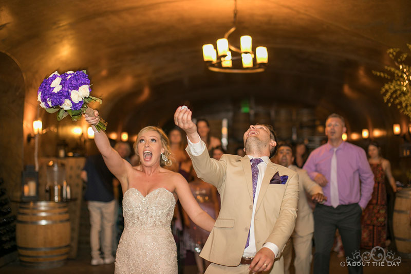 Boquet and Garter toss at the same time in the cave at Karma Vineyards