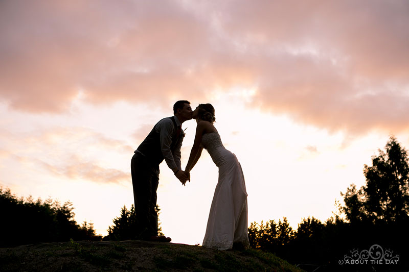Will & Madelyn bow for a sunset kiss at Lord Hill Farms