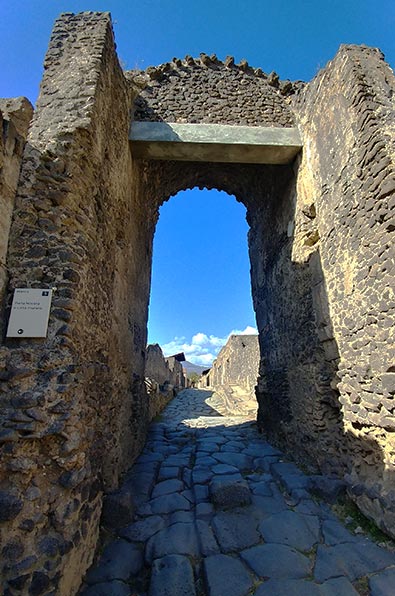 Entering through a side gate to Pompei
