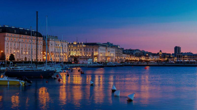 Sundown over Trieste's city center from the harbor