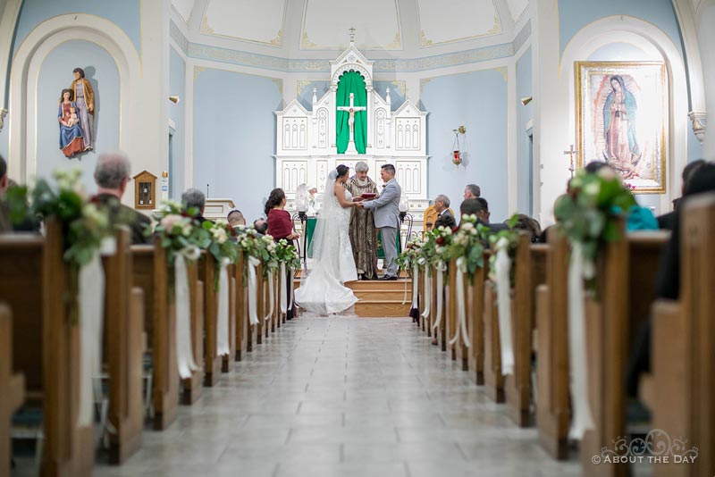 Erik and Faviola say their vows at St. Joseph's in Elgin, IL
