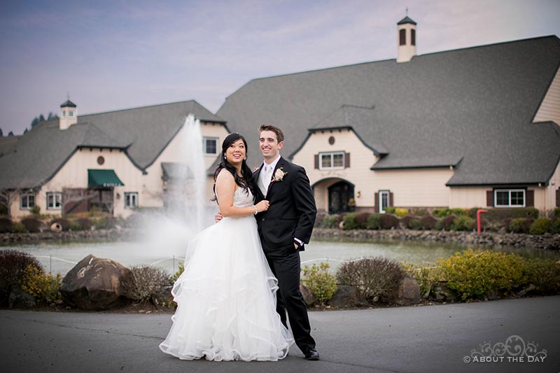 Bride and Groom with fountian at Zenith Vineyards