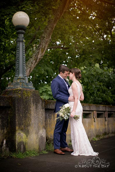 David & Vanessa kiss outside Parsons Gardens in Seattle