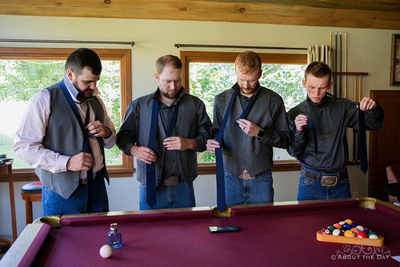 James and his groomsmen watch a tie video