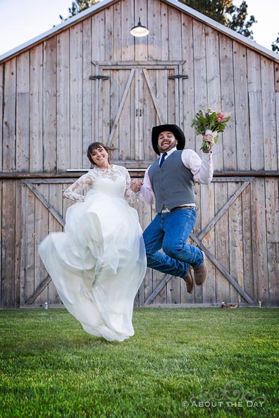 James & Courtney jump for joy at The Barn At Blue Meadows
