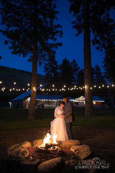 Bride & Groom snuggle fireside at The Barn At Blue Meadows