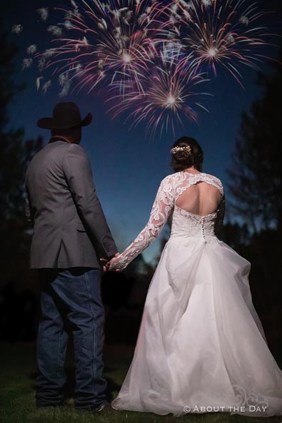 Bride & Groom watch 4th of July fireworks at The Barn At Blue Meadows